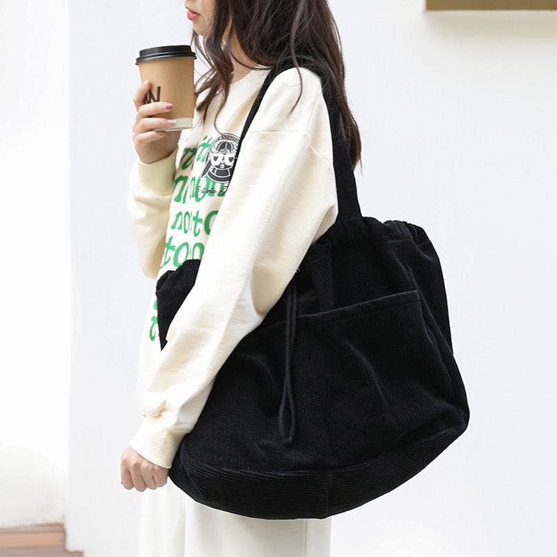 Drawstring Multi-pocket Handbag