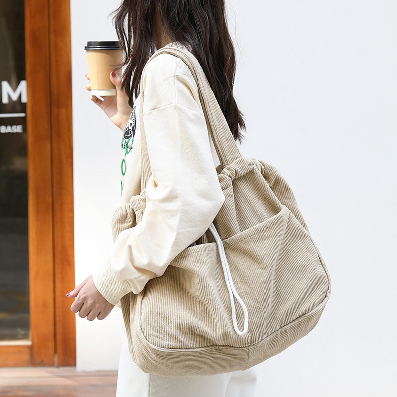 Drawstring Multi-pocket Handbag
