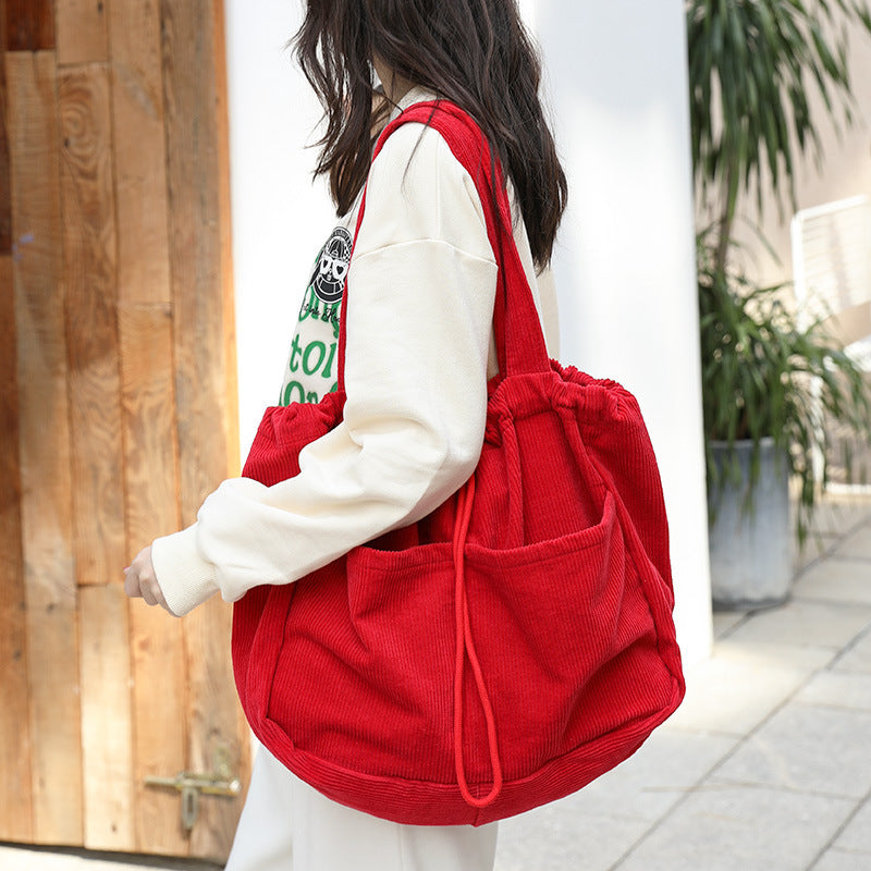 Drawstring Multi-pocket Handbag