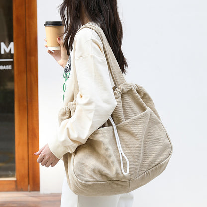 Drawstring Multi-pocket Handbag